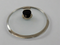 Glass lid with metal rim on a white background